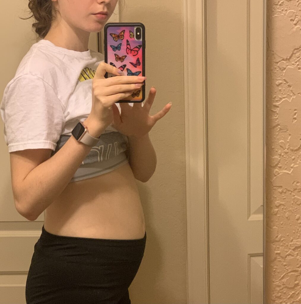 Showing the bloating that would happen after I ate. 